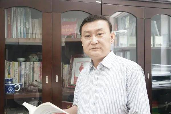 自治区党委政法委基层社会治理处副处长丁国栋