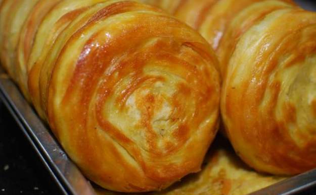 西安 宫廷香酥牛肉饼也称" 千层牛肉饼 "已经走过一千二百多年的历史