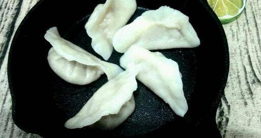 怎么捏饺子简单的方法 95e177c7c3e34bc3a79ed268ceab2def.jpeg