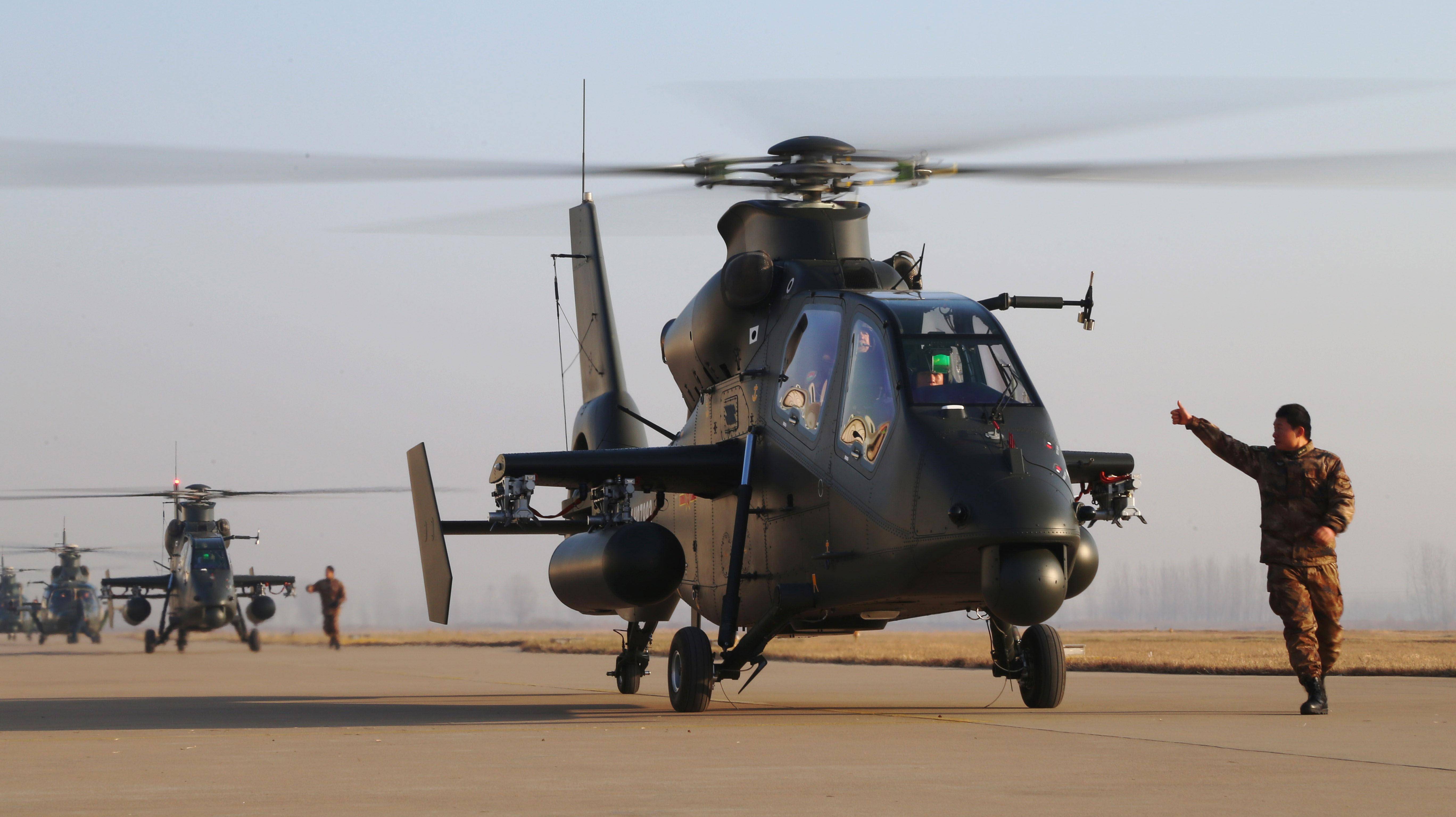 旋翼轴上方装有毫米波雷达的武装直升机除ah-64d长弓阿帕奇外,还有