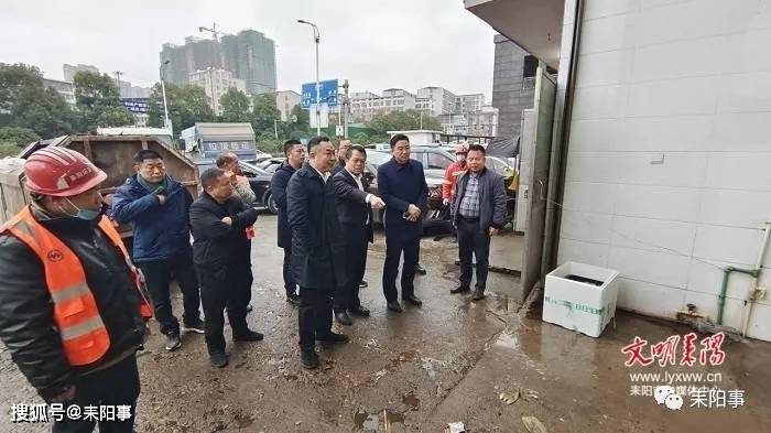 耒阳:温馨"年夜饭" 情暖城市"美容师"_尹建恒_活动_市容