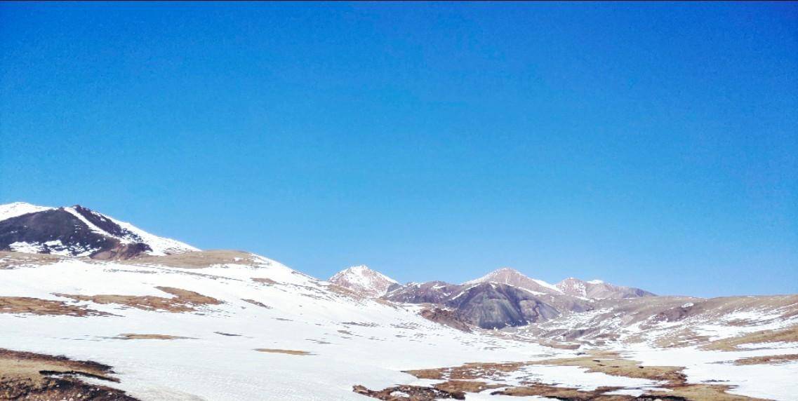 骑行巴州，从班禅沟翻越艾肯达坂抵达火烧桥，看斑斓雪山