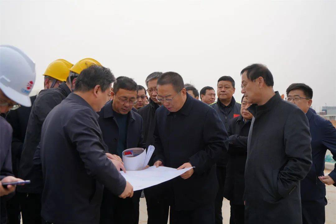 会员动态李春临赴陕建九建集团榆林市科创新城调研省十七运主场馆及