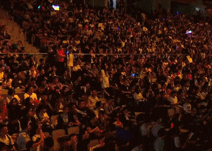 a ton of people are screaming in the stad