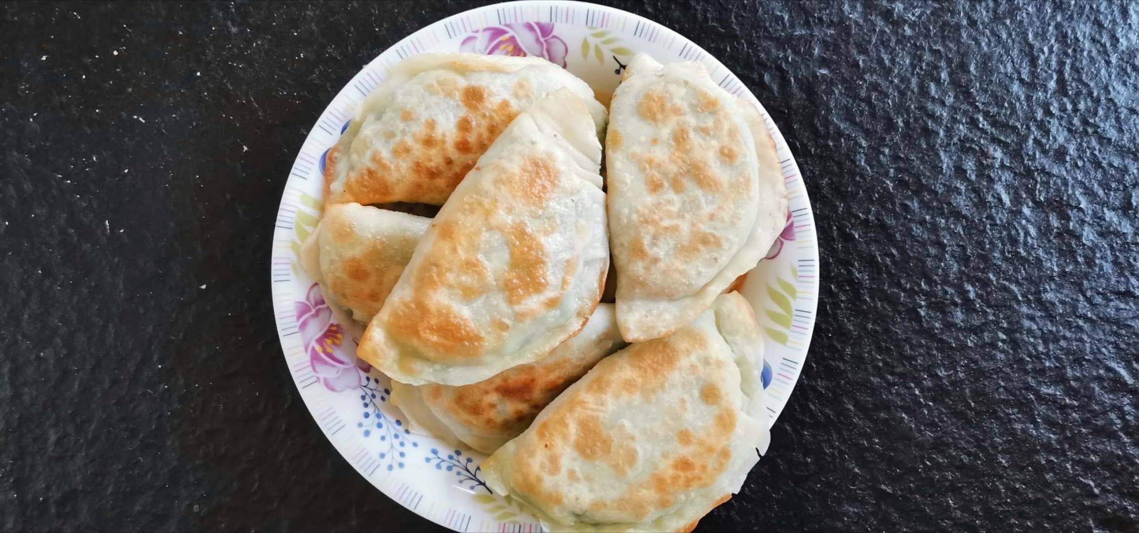 长春传统厨艺美食 鸡蛋韭菜馅饺饼