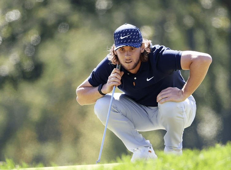 组图:美国公开赛麦克罗伊挥杆 沃尔夫若有所思