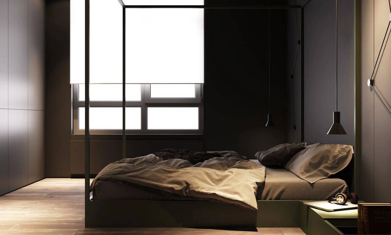 卧室的设计基本与客厅保持一致,黑色的柜体,墙体,原木色调的木纹砖