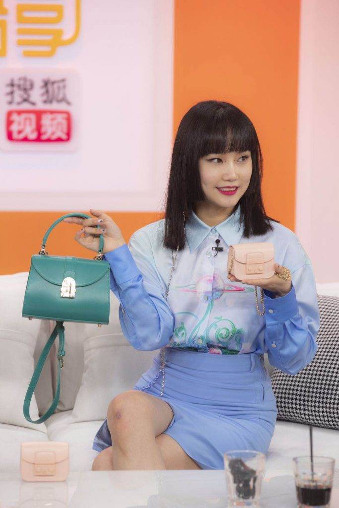 《搜狐姐姐好物分享再添新热度 黄龄与boss张朝阳惊喜合作》