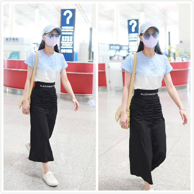 黑色|黄圣依穿着渐变T恤,丝毫没有“豪门阔太”感,看起来清新简约