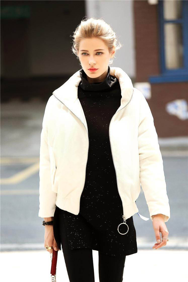 颈部|那英也有懈怠的时候,朴素羽绒服搭开衫,与老公“红配绿”更显土