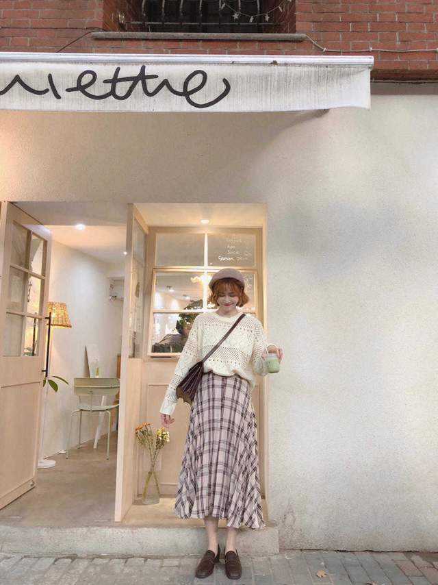 的作用 今秋怎么穿才漂亮?“格子裙+针织衫”简约洋气,美出了新高度