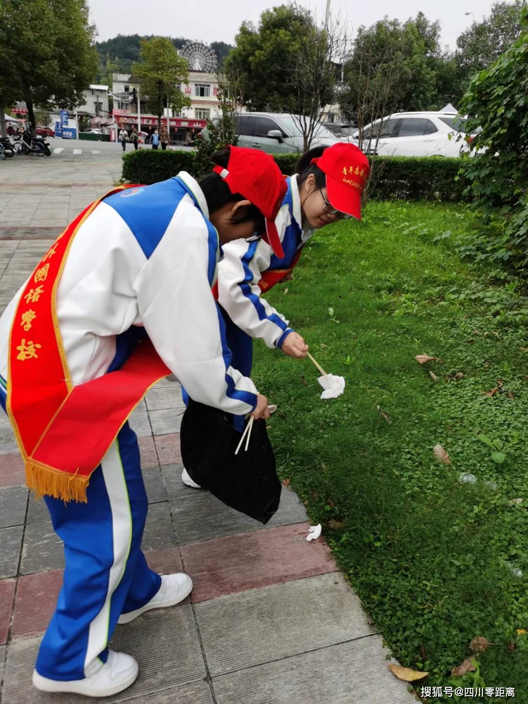 文明,是城市最美的风景—江油外国语学校高中部志愿者服务活动