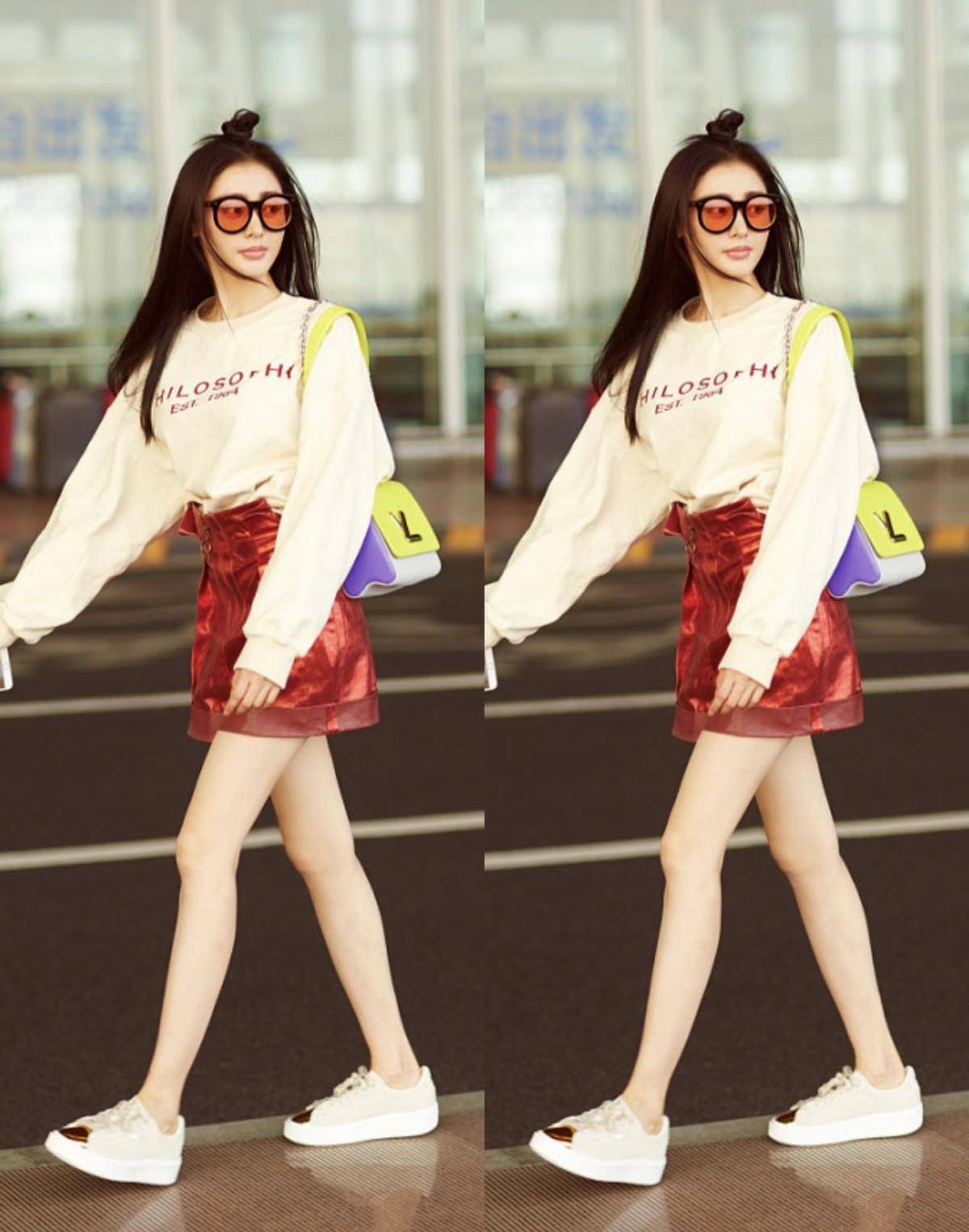 张天 张天爱的造型正面看就很美，用蝴蝶结连接好有个性，气质很妩媚