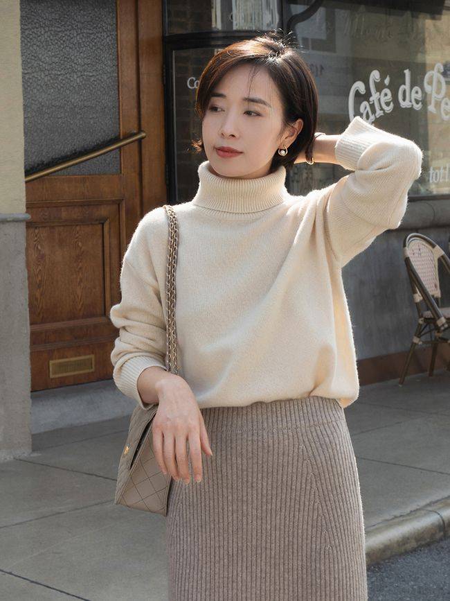 塑造出 漆皮靴的风格百变，可以塑造出很多种气质的穿搭