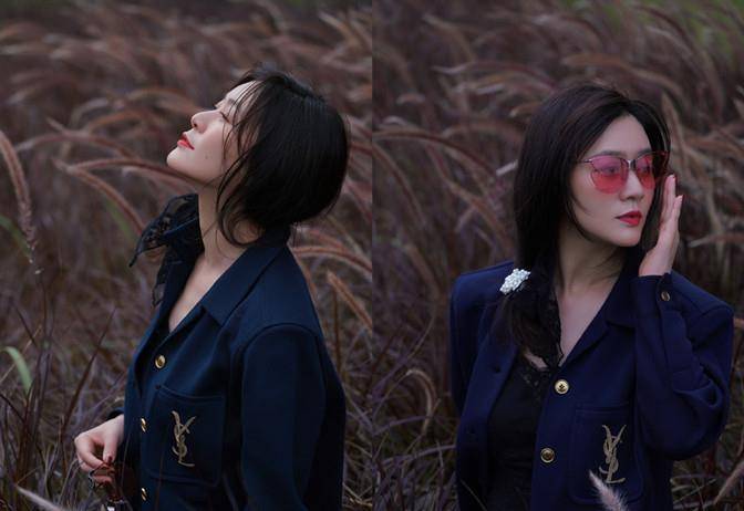 魅力 田海蓉真会选场所！穿黑西装芦苇荡拍片太明智，咬芦苇草美上三分