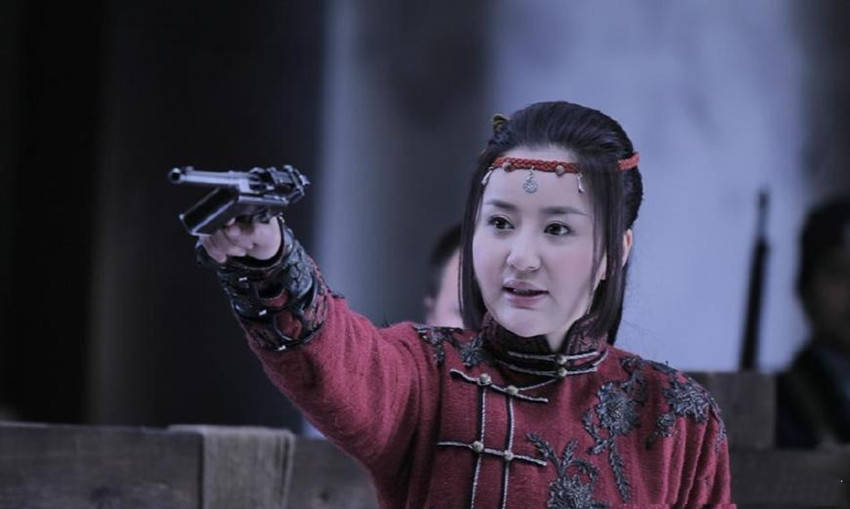 1948年,覃国卿在桑植县一带烧杀抢掠时,无意间遇到了青春靓丽的田玉莲