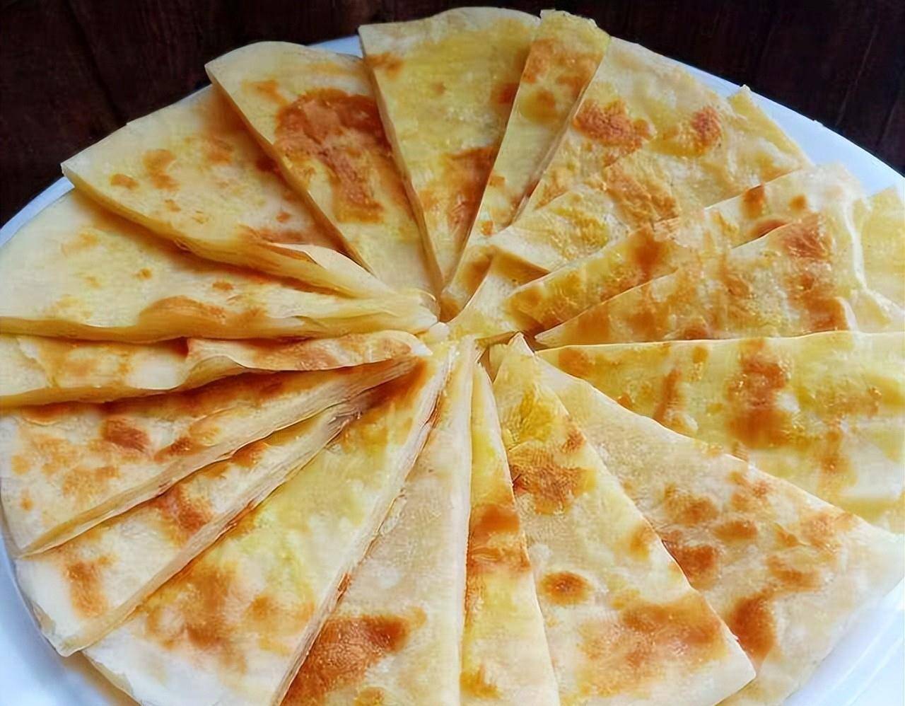 原创烙饼技巧一杯面粉一碗水最简单的食材做出软乎又筋道的饼