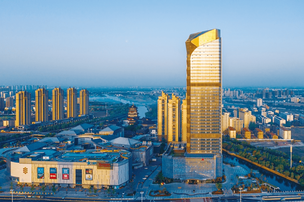 国投集团:盐城国贸中心项目荣获中国建设工程鲁班奖2022年,悦达集团以