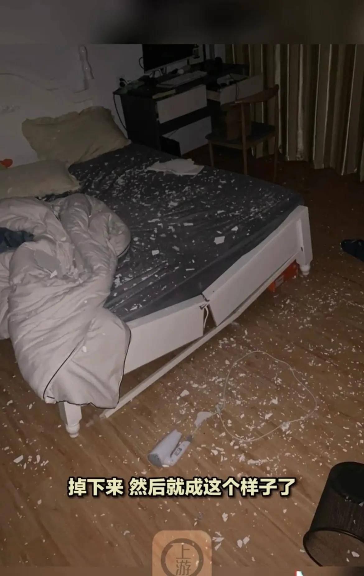 男子租房搬家第1天踩穿地板,摔进楼下女子卧室把床砸断_事情_房间