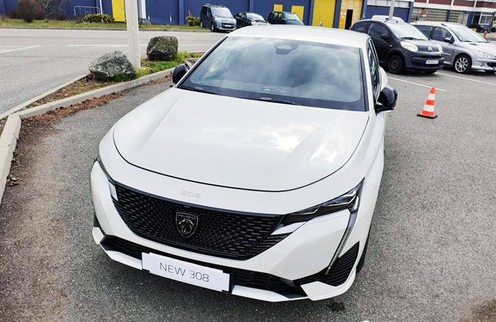 2021款"标致308"工厂实拍,换全新logo,颜值赶超bba!_搜狐汽车_搜狐网