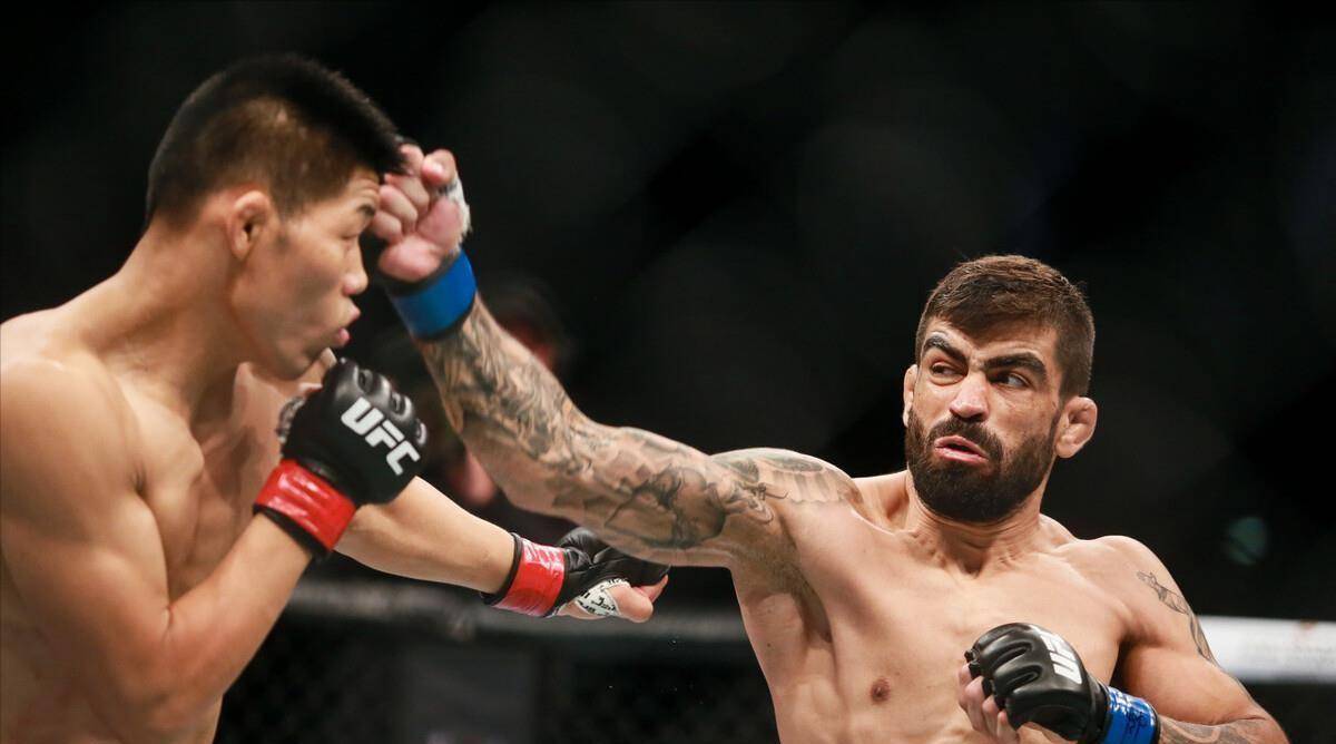 ufc李景亮vs穆斯里穆,赢过输过没怂过,依然义无反顾_比赛_格斗_选手