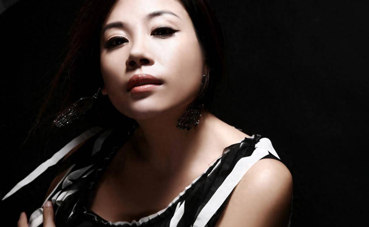 歌手门丽的真名叫什么?