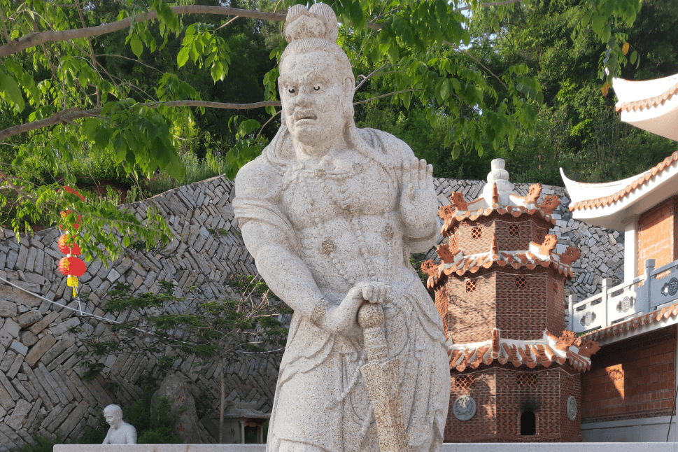 石雕哼哈二将厂家安装寺院哼哈二将石雕像雕工细腻