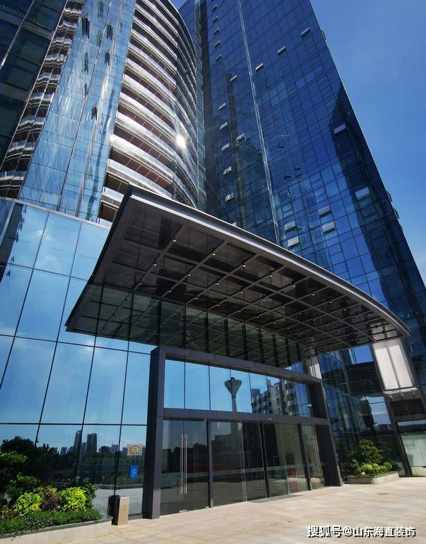 写字楼办公室玻璃幕墙的好处,写字楼玻璃幕墙装饰的优点