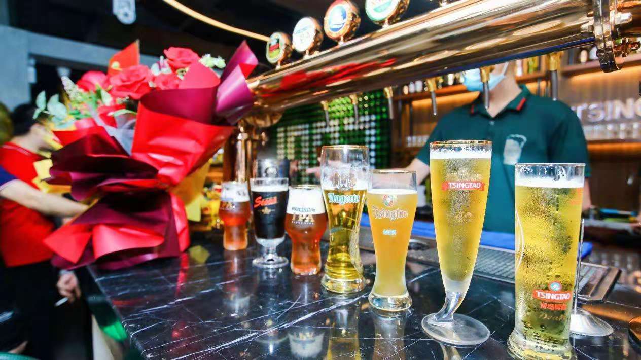 啤酒文化新体验海南首家青岛啤酒品牌体验店tsingtao1903音乐餐吧开业