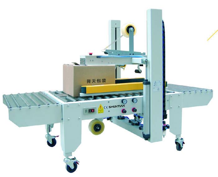 自动封箱机是怎么工作的 自动封箱机的工作流程 胶带
