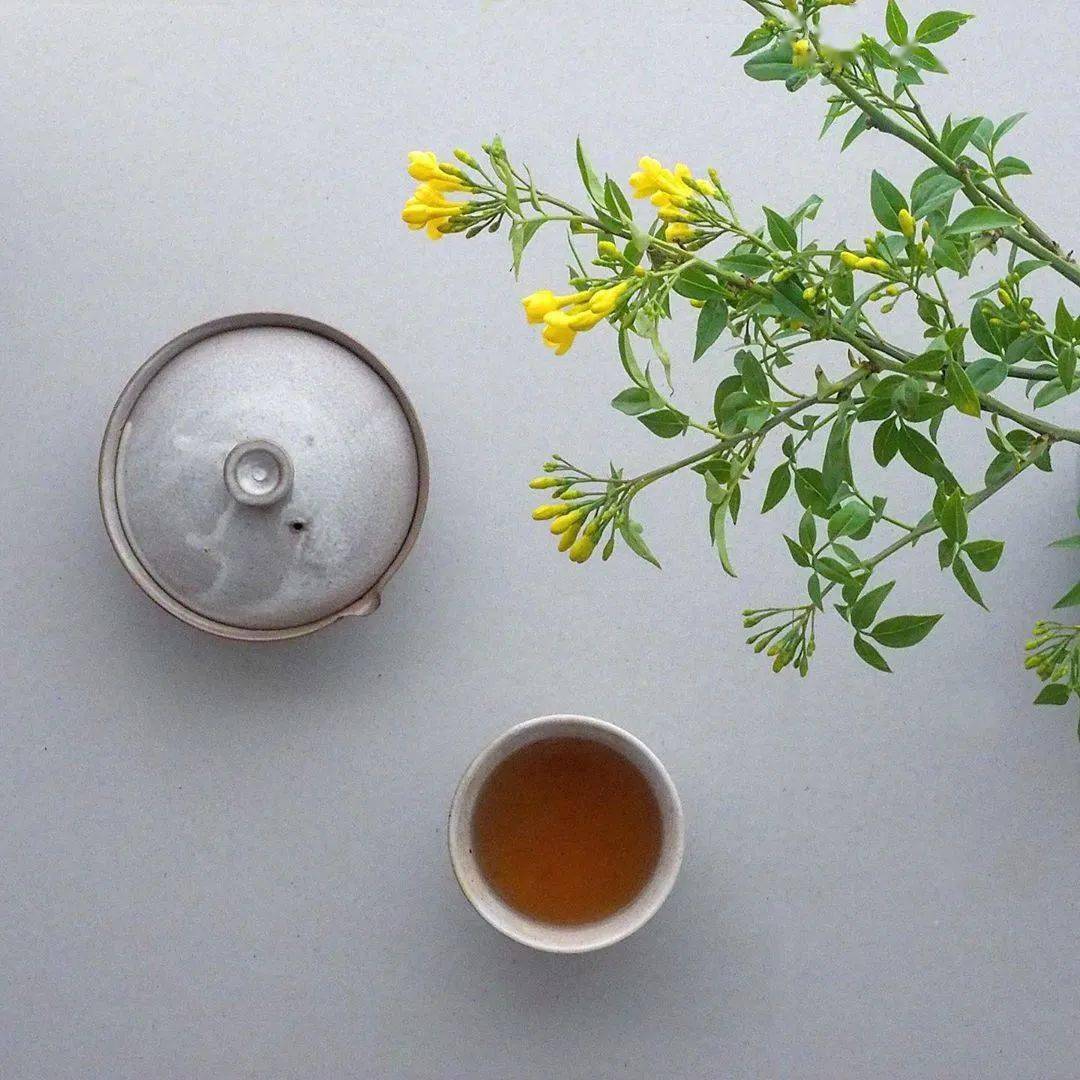 品一杯茶,赏一朵花.