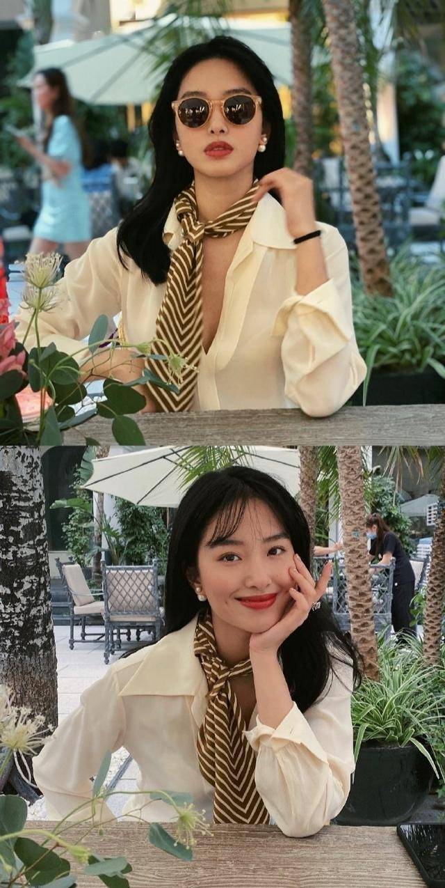 影视剧里最常见的白色衬衫配丝巾,港星的一回眸,一颦一簇之间都让人