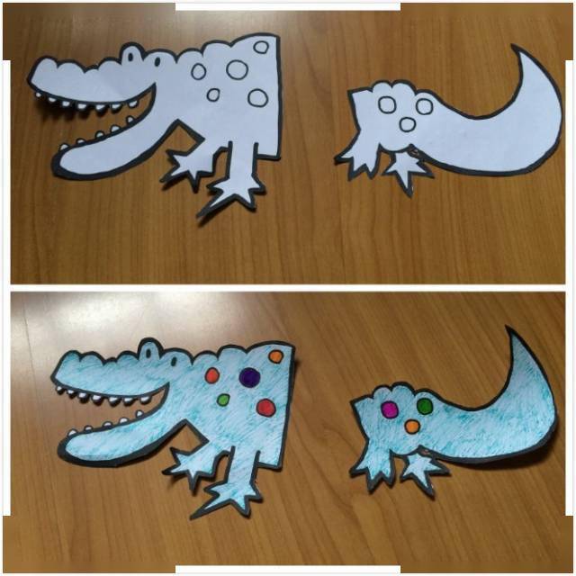 将彩色纸折叠作为鳄鱼的身体部分,粘贴后将牙签固定在鳄鱼脚上,可以