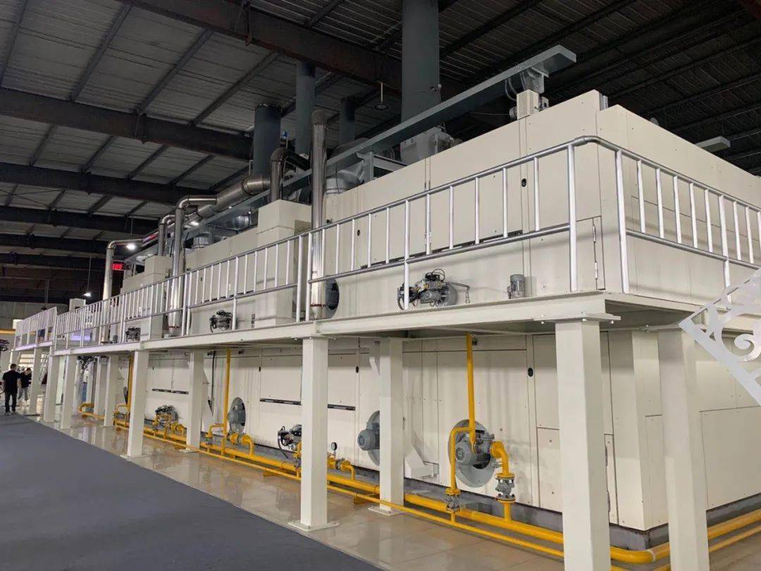 远信工业新品发布会:y9000型双层热风拉幅定形机提效节能达到新高度