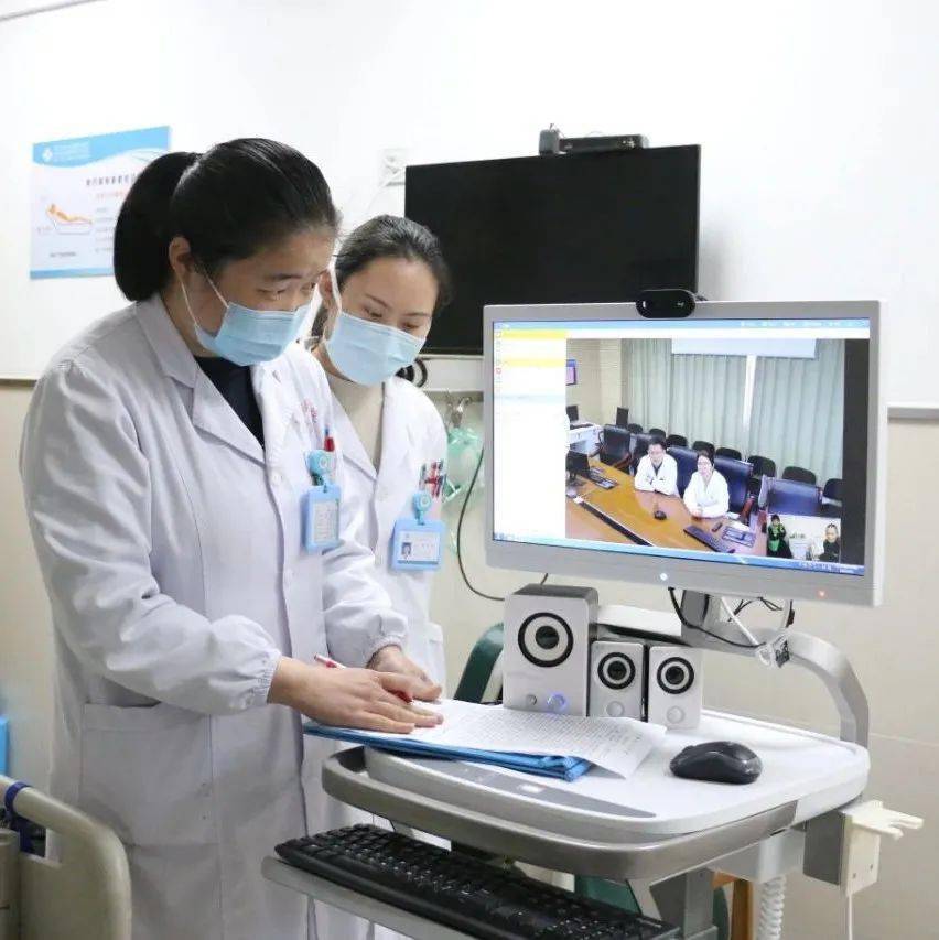 5g远程移动查房系统通过5g卫生专网,区级医院专家和基层分院医生,患者