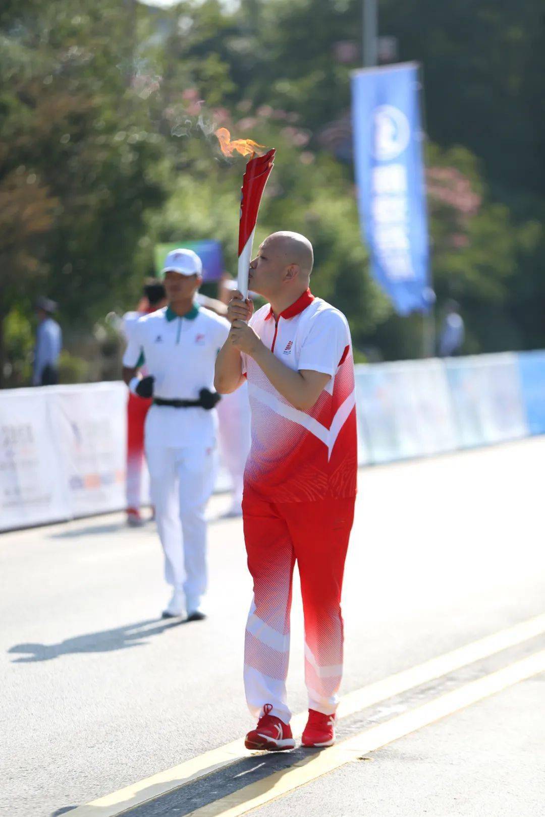 十四运会和残特奥会火炬传递渭南站开启67名火炬手接力奔跑