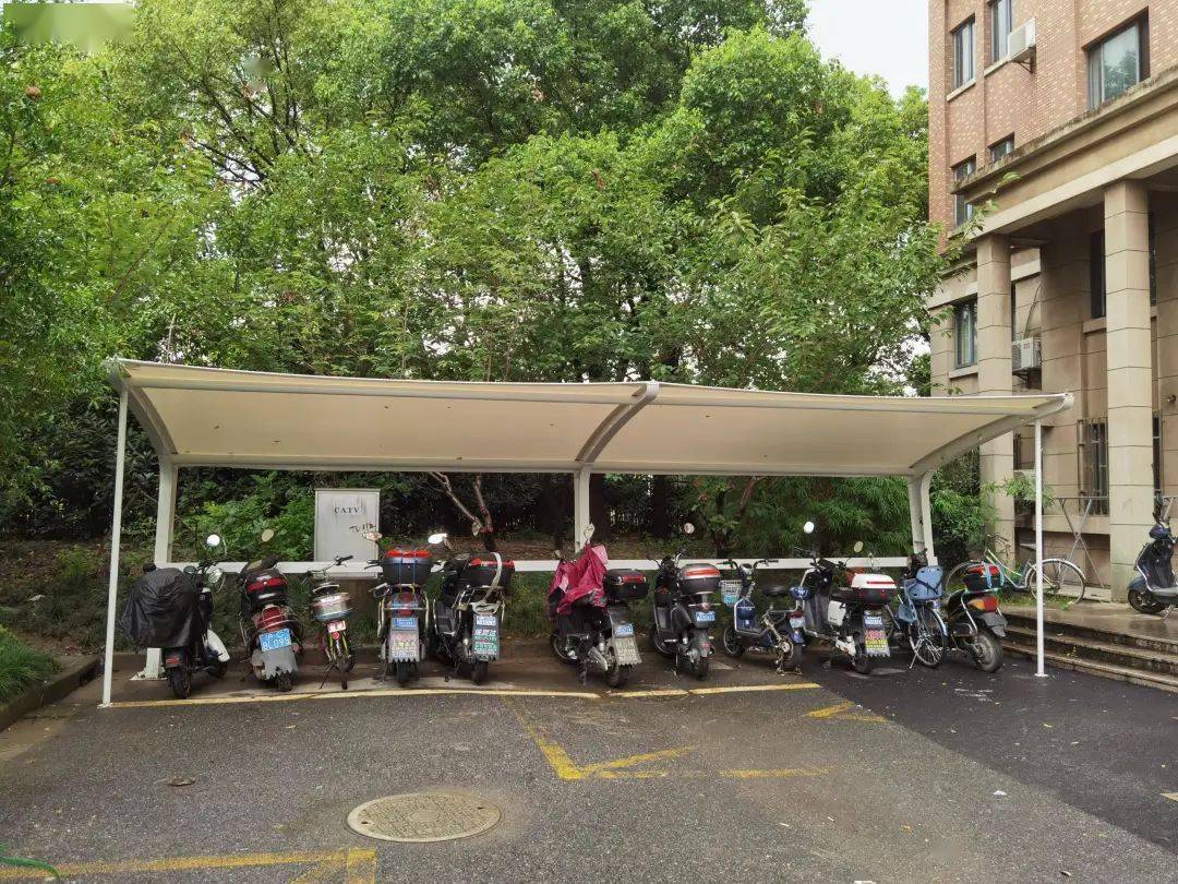 让"露宿"在外的非机动车有"家"可归,顾村这个小区有妙招