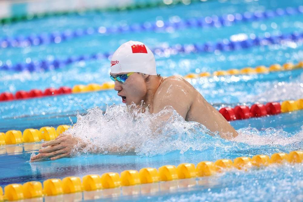 上海游泳获十四运首金,覃海洋感谢教练叶瑾的无私付出