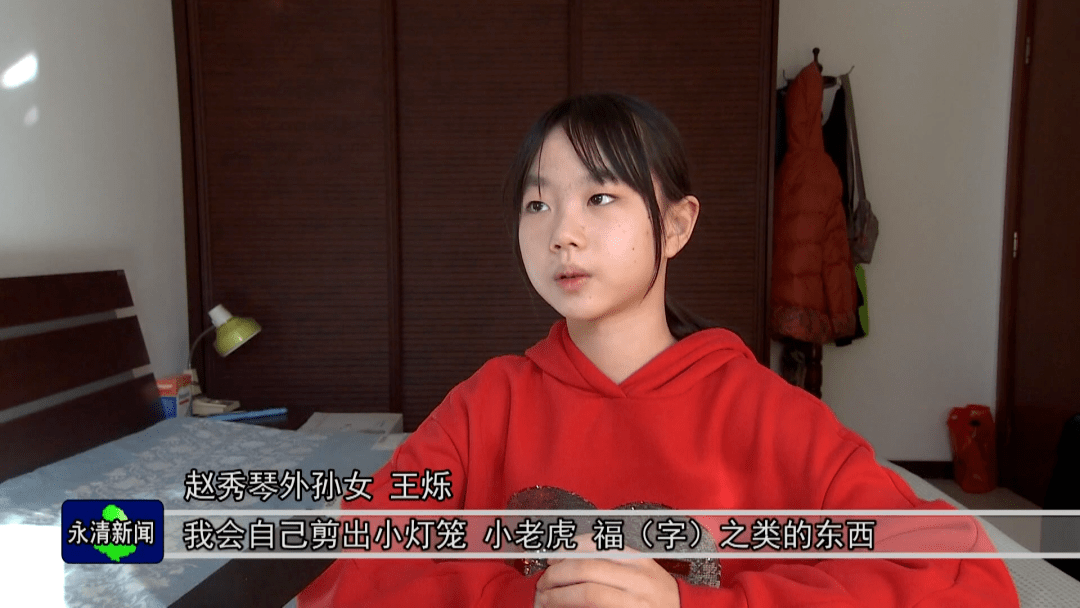 网络中国节61春节古稀老人赵秀琴纸上生花迎新春