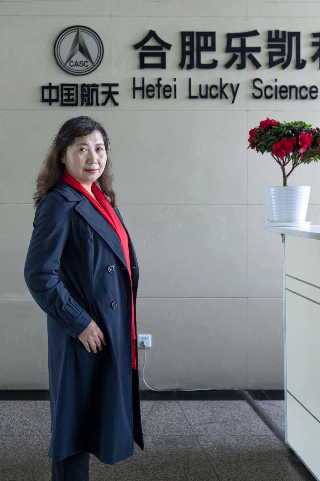 编校周勇胡斐然邵伟