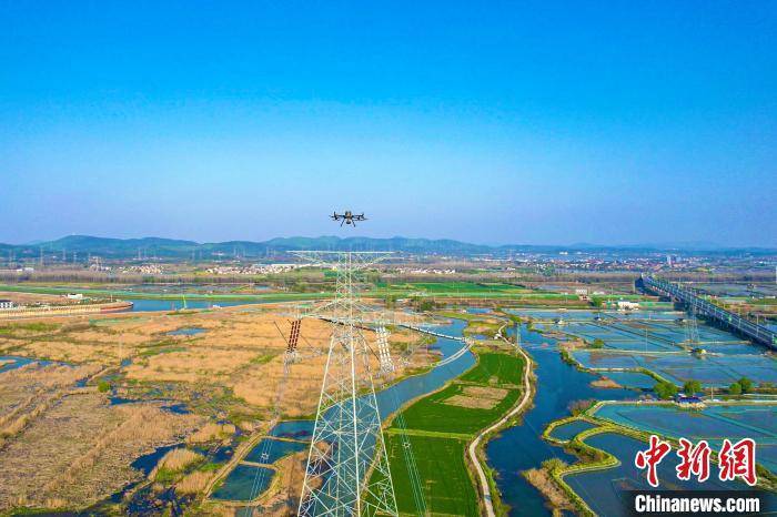 白鹤滩—江苏特高压工程完成关键一"跨"_线路_电力_输电