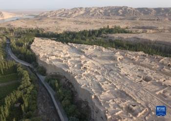 新疆吐鲁番：一家三代人跨越半世纪守护西域千年故城「图」