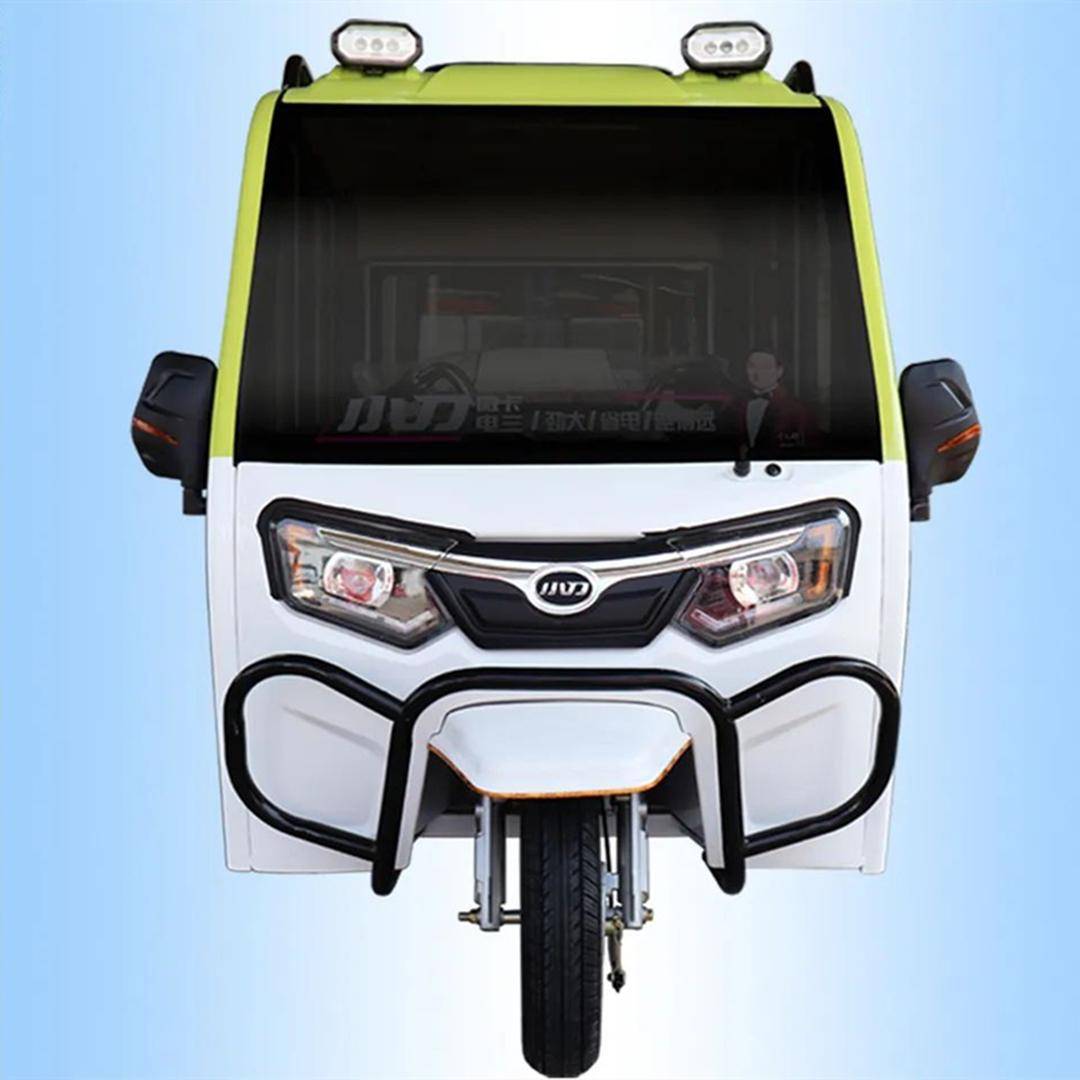 小刀500全封闭电动三轮车亮相,动力足,续航远,可载5人以上_搜狐汽车