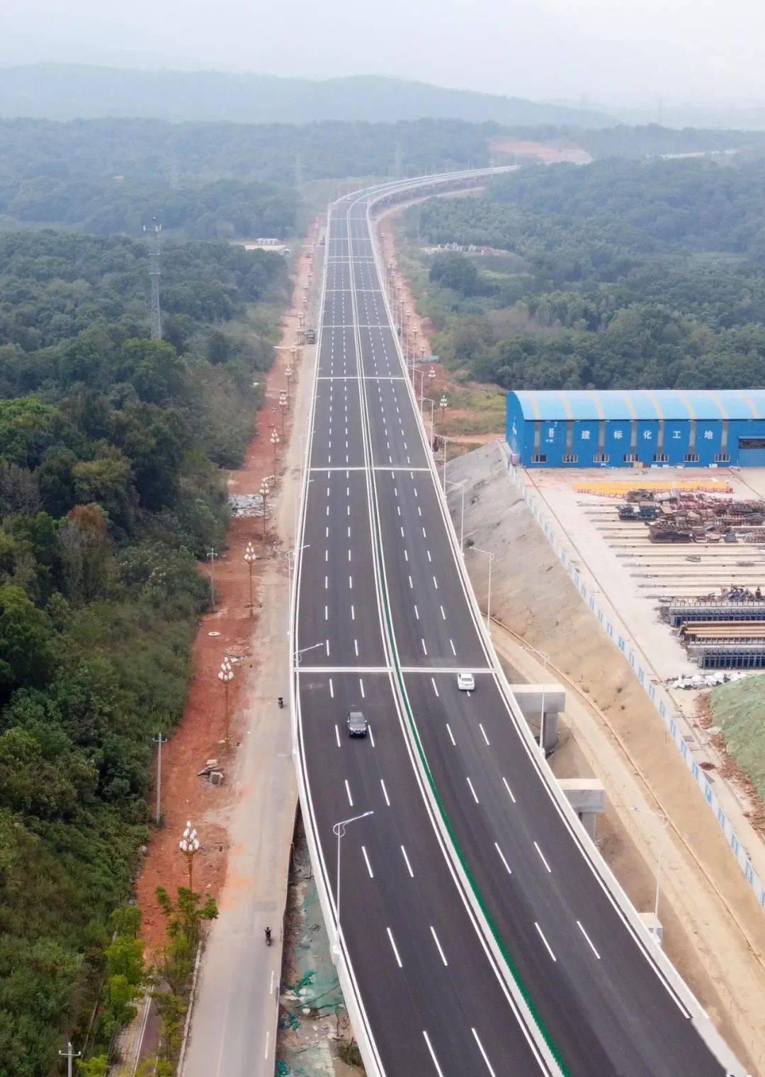 九江收费站至庐山索道段正式通车.九江新建快速路9月26日