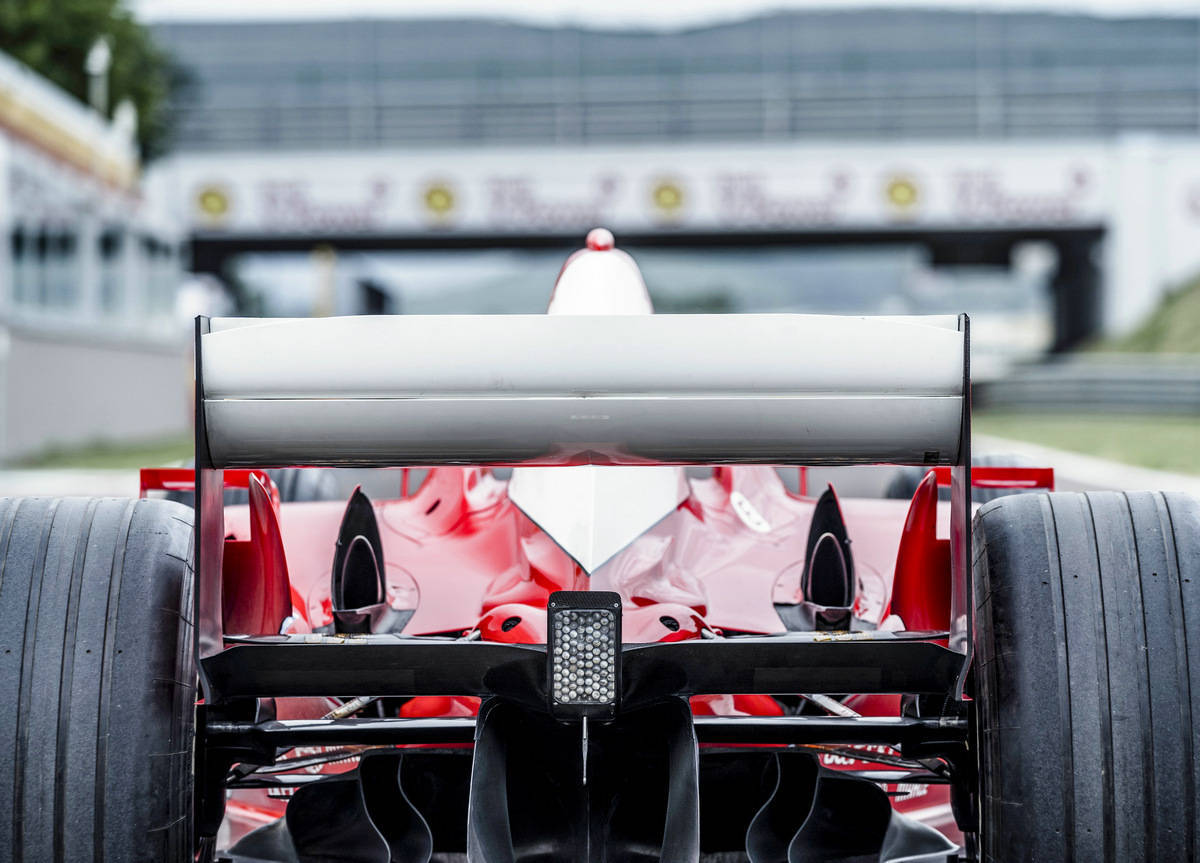 F2003 Rear 售价超过1个亿!舒马赫第六个冠军座驾,法拉利F2003-GA拍出天价_搜狐汽车_搜狐网