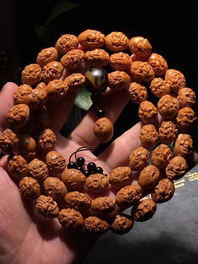 橄榄核手串盘花了，该如何处理？_搜狐网