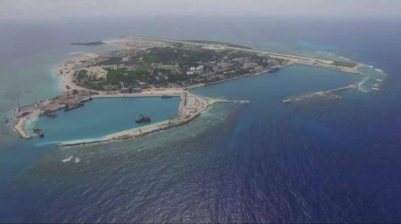 (祖国的明珠:美丽的南沙群岛)南海是一片半封闭型海域,南海北面和西面