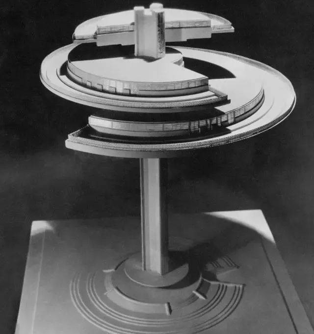 (norman bel geddes)设计了一座能够绕中轴旋转的餐厅,有3个圆形结构